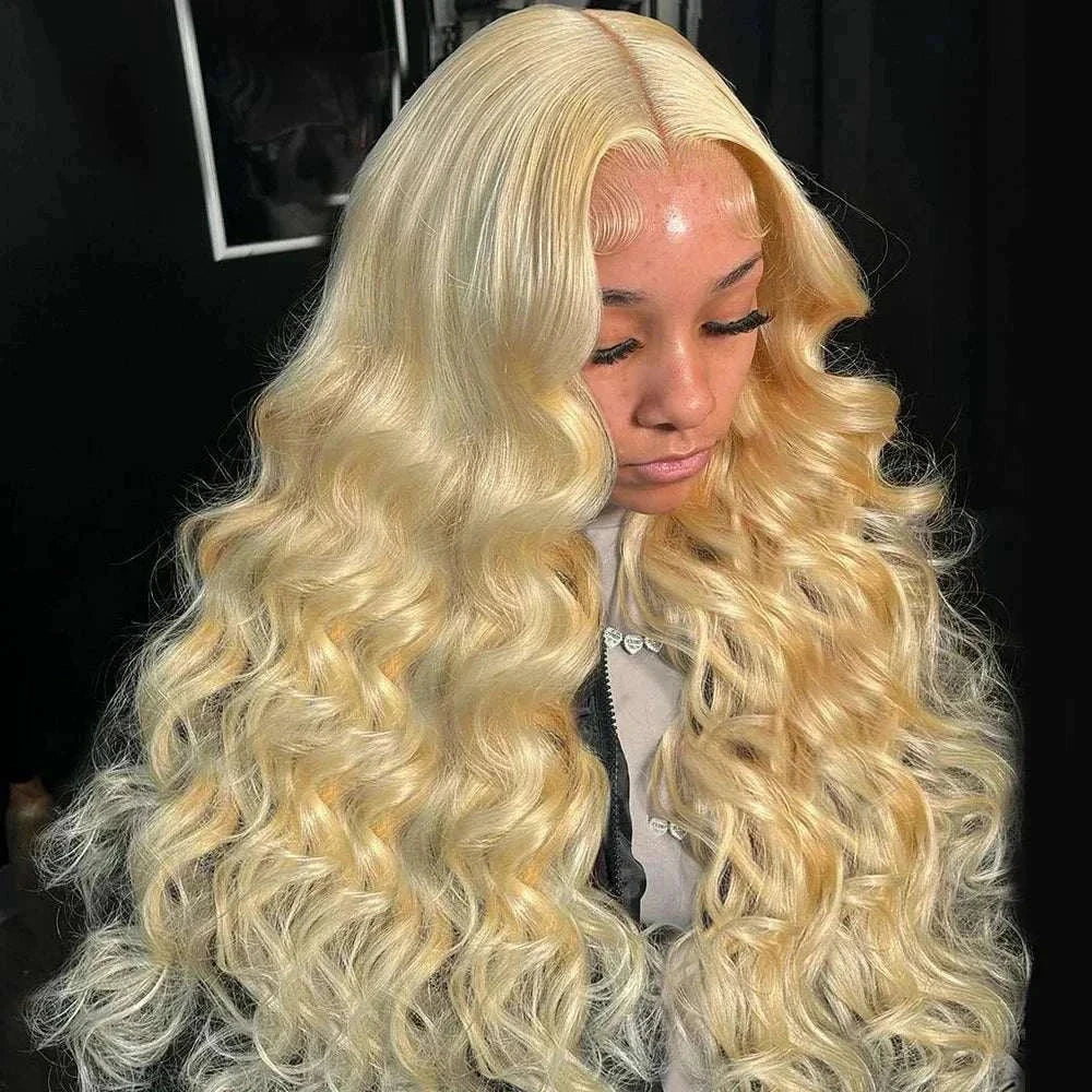 Chic honey blonde body wave lace wig made from authentic human hair.