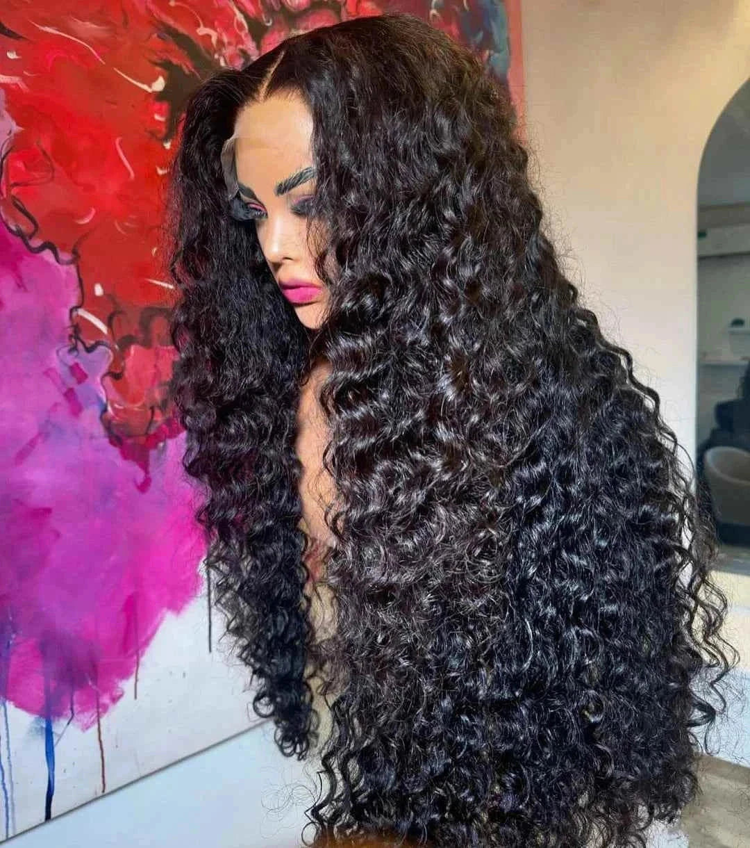 Curly wave frontal wig with deep curly texture and HD lace.
